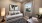 a room with a couch and a desk